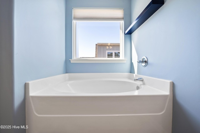 bathroom featuring a tub