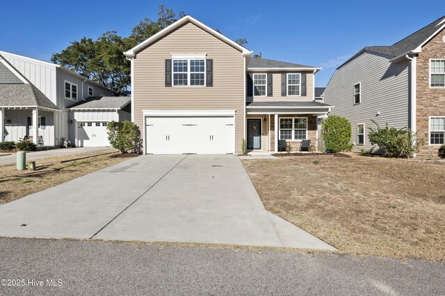 6507 Rustling Leaves Way, Wilmington, NC 28409 - traditional home with driveway, a garage, and a porch