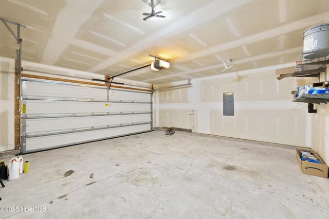 6507 Rustling Leaves Way, Wilmington, NC 28409 - garage featuring a garage door opener and electric panel