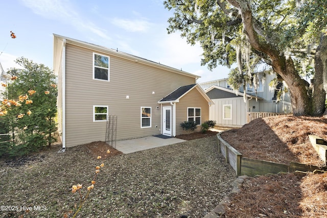 back of property featuring a patio