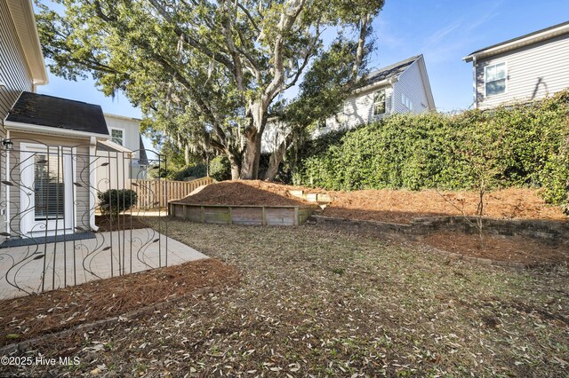6507 Rustling Leaves Way, Wilmington, NC 28409 - fenced yard featuring a patio