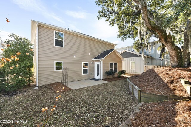 6507 Rustling Leaves Way, Wilmington, NC 28409 - rear view of property featuring a patio