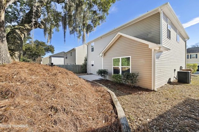 exterior space featuring central air condition unit