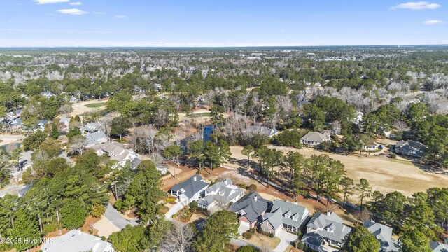 6507 Rustling Leaves Way, Wilmington, NC 28409 - aerial view of property's location featuring nearby suburban area and a tree filled landscape