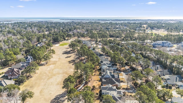 6507 Rustling Leaves Way, Wilmington, NC 28409 - aerial overview of property's location with nearby suburban area and a nearby body of water