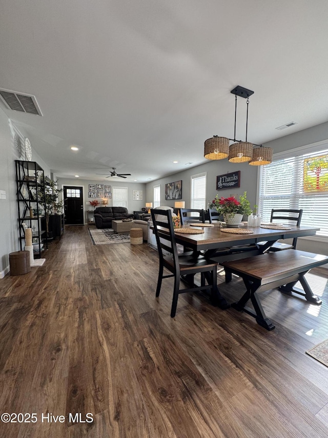 dining room with visible vents, dark wood finished floors, and recessed lighting