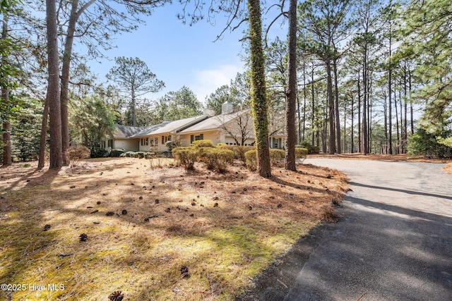 exterior space featuring driveway