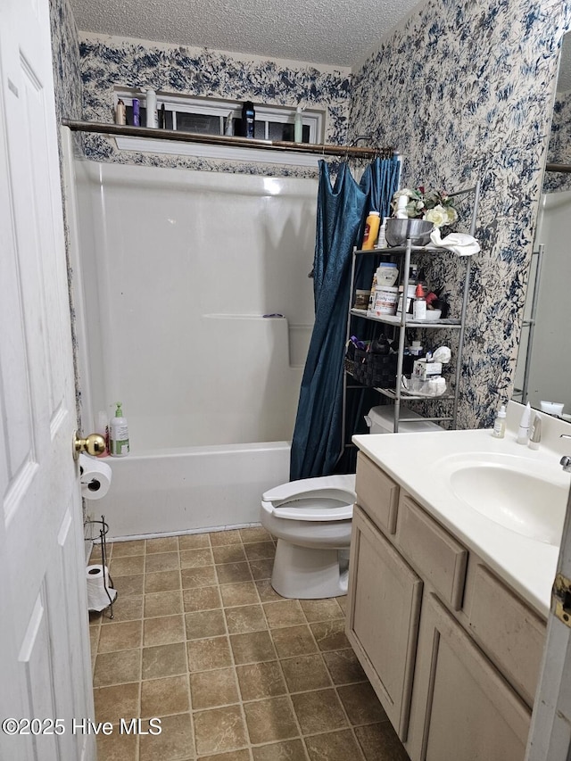 full bathroom with shower / tub combo, vanity, toilet, and a textured ceiling