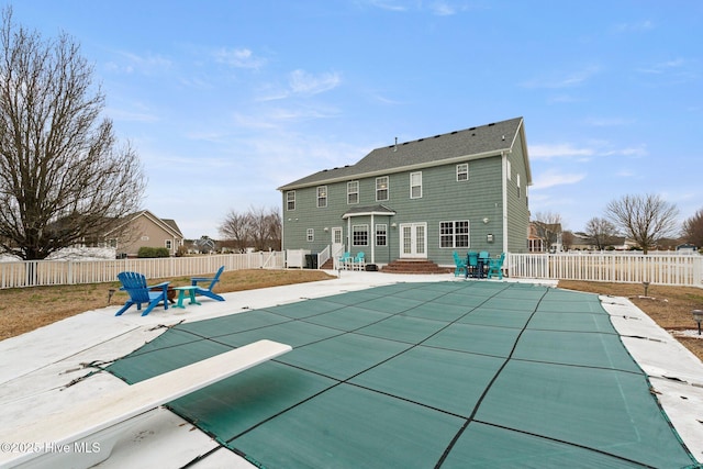 view of swimming pool featuring entry steps, a patio area, a fenced backyard, and a fenced in pool