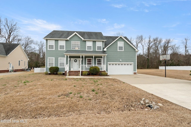 view of front of property featuring concrete driveway, a porch, an attached garage, and a front yard