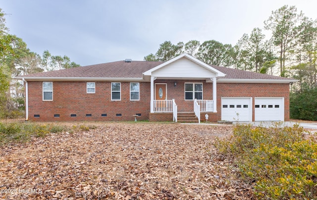 ranch-style home with a garage, covered porch, roof with shingles, crawl space, and brick siding