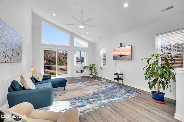 sitting room featuring recessed lighting, wood finished floors, visible vents, and baseboards