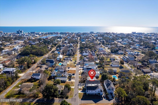 aerial view with a water view and a residential view