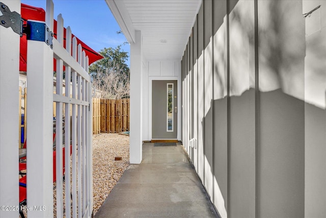 view of patio featuring fence