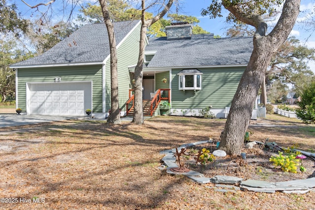 view of front of home featuring a garage