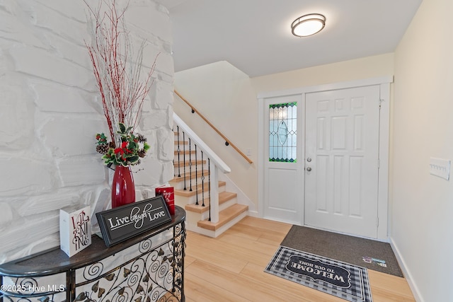 entrance foyer with hardwood / wood-style flooring