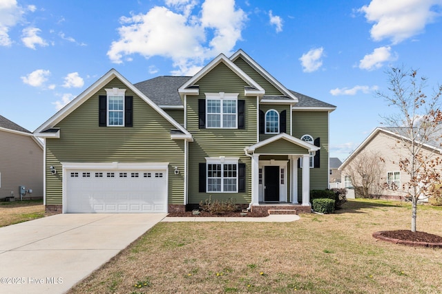 traditional home featuring a garage, concrete driveway, a front lawn, and a shingled roof