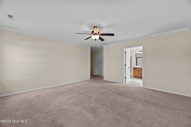 unfurnished bedroom with light carpet, baseboards, visible vents, and ornamental molding