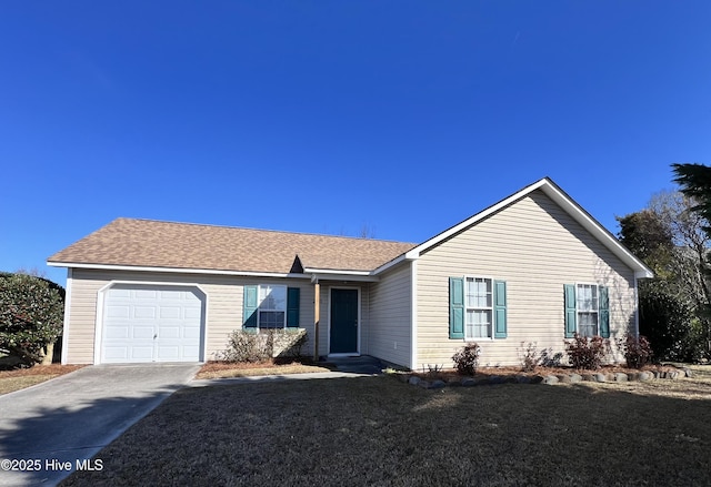 ranch-style house with a front lawn, a garage, roof with shingles, and driveway