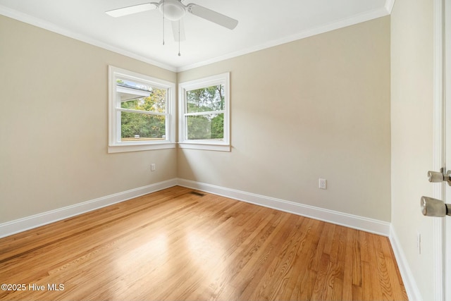 unfurnished room featuring crown molding, hardwood / wood-style flooring, and ceiling fan