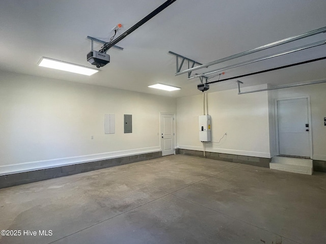 garage with electric panel and a garage door opener