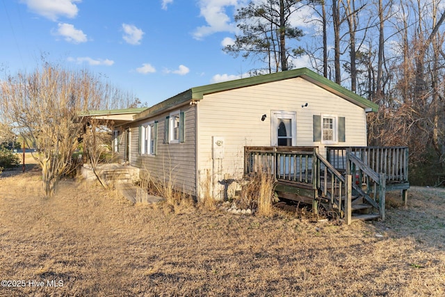 318 Locks No 1 Rd, Riegelwood, NC 28456 - view of front of home with a wooden deck