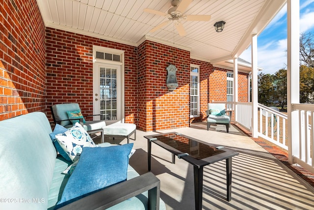 view of patio featuring ceiling fan and an outdoor living space