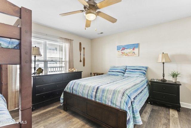 bedroom featuring wood-type flooring and ceiling fan