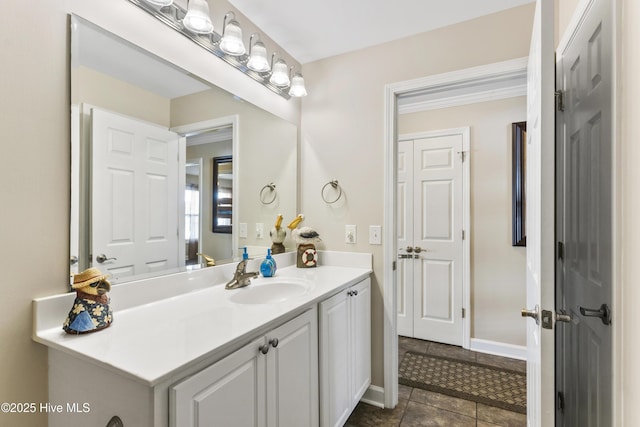 bathroom with vanity and tile patterned floors