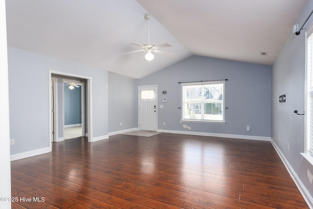 unfurnished living room with ceiling fan, dark hardwood / wood-style floors, and vaulted ceiling