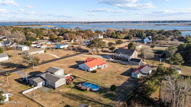 bird's eye view with a water view and a residential view