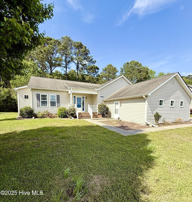225 Adams Ln, Washington, NC 27889 - ranch-style house with a front yard and a shingled roof