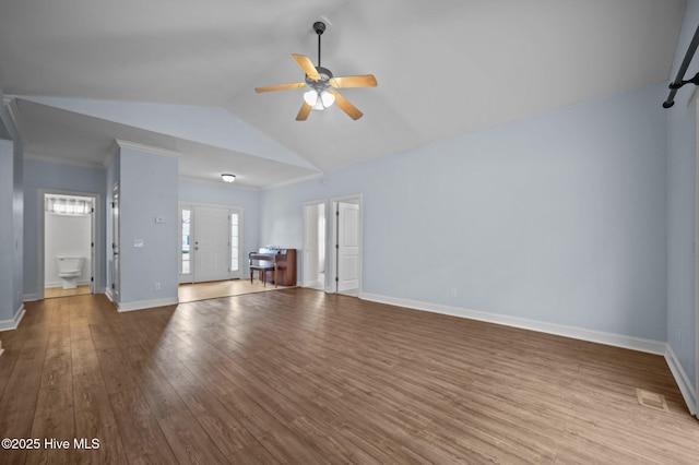 unfurnished living room with ceiling fan, lofted ceiling, and light wood-type flooring