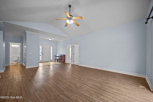 225 Adams Ln, Washington, NC 27889 - unfurnished living room with wood finished floors, a ceiling fan, lofted ceiling, and baseboards