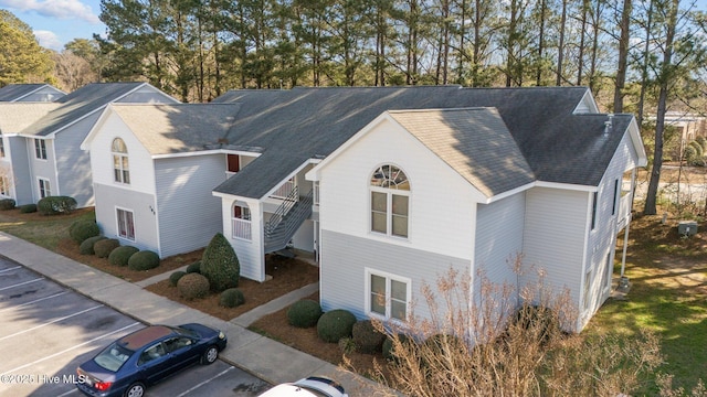 view of front of home with uncovered parking