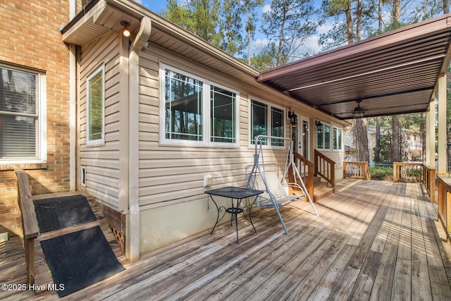 wooden deck with ceiling fan