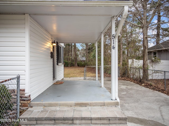 view of patio / terrace featuring fence