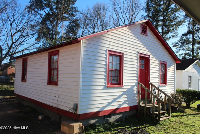 1207 Harrington St, Washington, NC 27889 - view of front of house featuring crawl space and entry steps