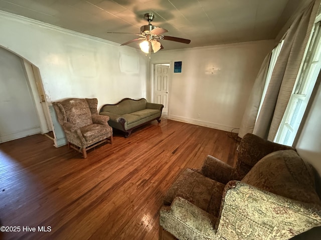 1207 Harrington St, Washington, NC 27889 - living area with wood-type flooring, a ceiling fan, ornamental molding, and baseboards