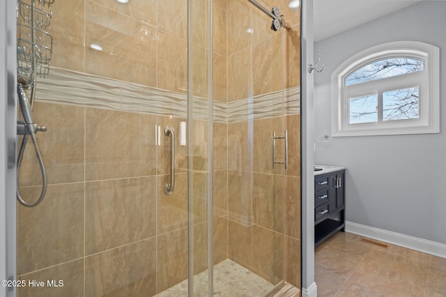 3953 Palm St SE, Bolivia, NC 28422 - full bathroom with a stall shower, vanity, and baseboards
