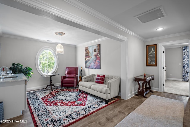 3953 Palm St SE, Bolivia, NC 28422 - living room featuring wood finished floors, crown molding, and baseboards