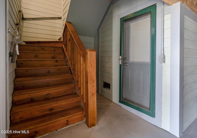 3953 Palm St SE, Bolivia, NC 28422 - stairway featuring wooden walls and vaulted ceiling