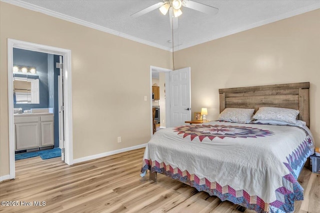 bedroom featuring a textured ceiling, connected bathroom, wood finished floors, baseboards, and ornamental molding