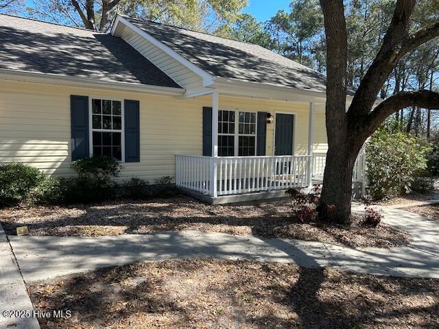 view of home's exterior with a porch