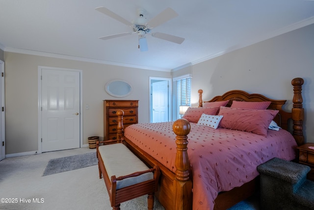 bedroom with baseboards, light colored carpet, ornamental molding, and a ceiling fan