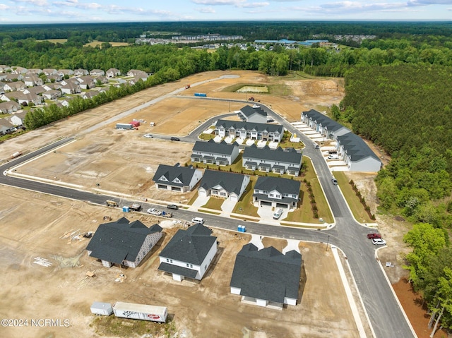 aerial view with a residential view and a forest view