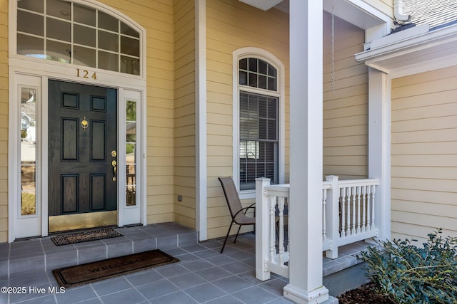 property entrance with a porch