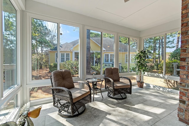 sunroom featuring a wealth of natural light