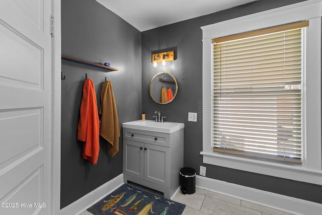 bathroom with vanity and tile patterned flooring