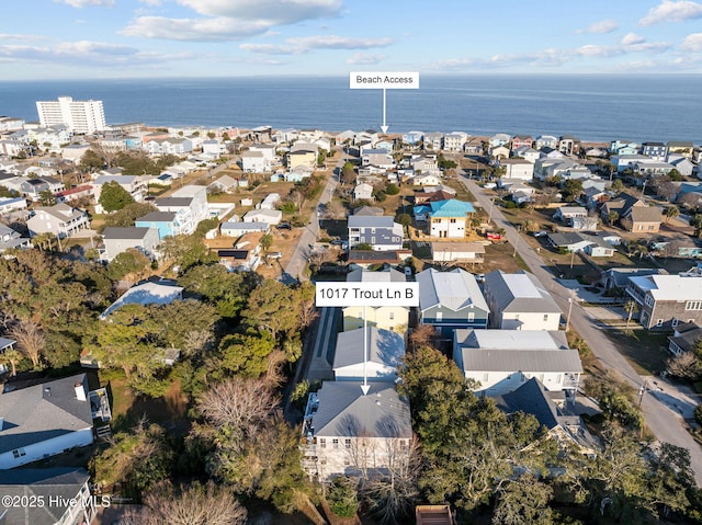 bird's eye view with a water view and a residential view